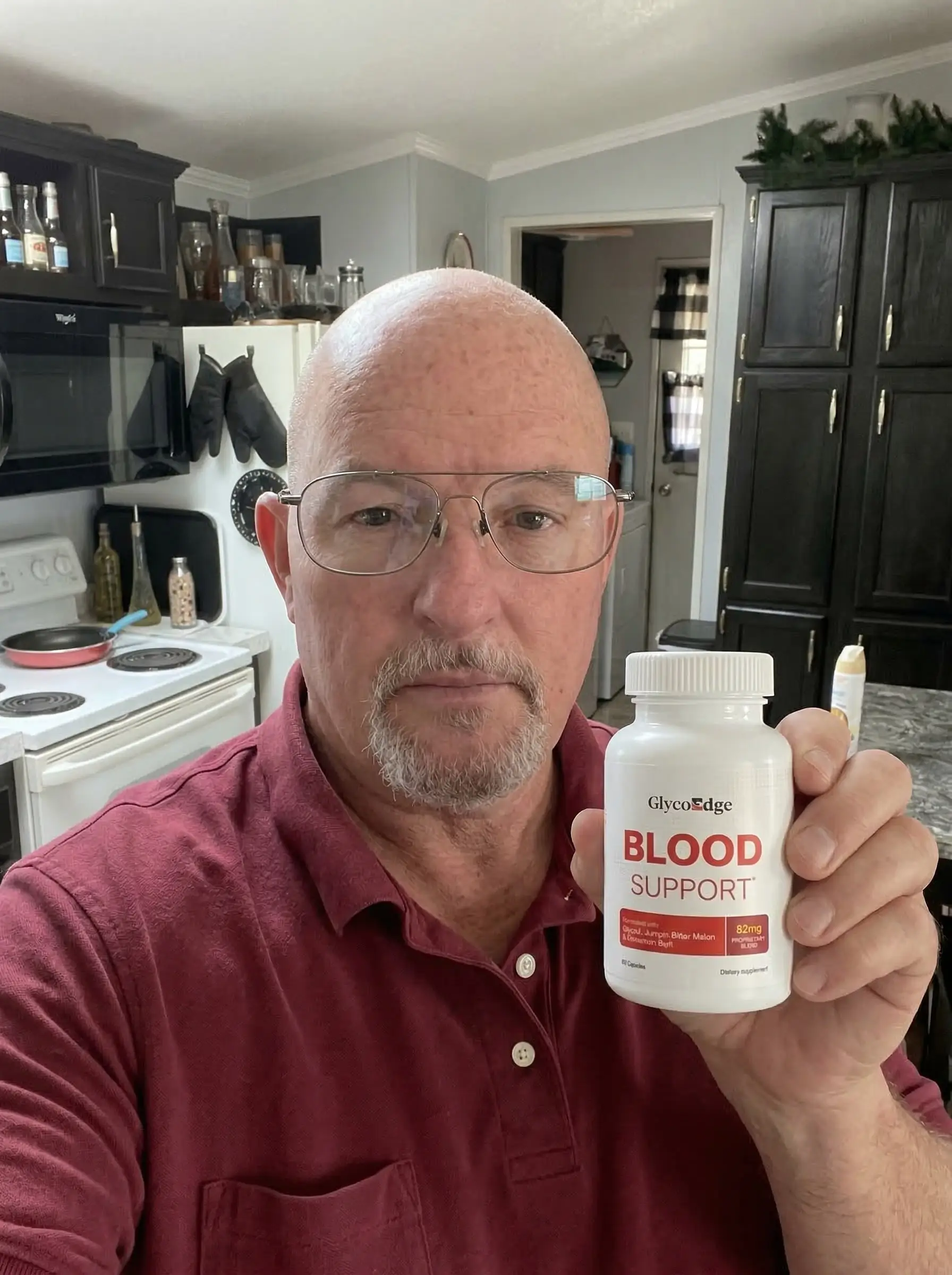 Robert K. smiling with GlycoEdge bottle