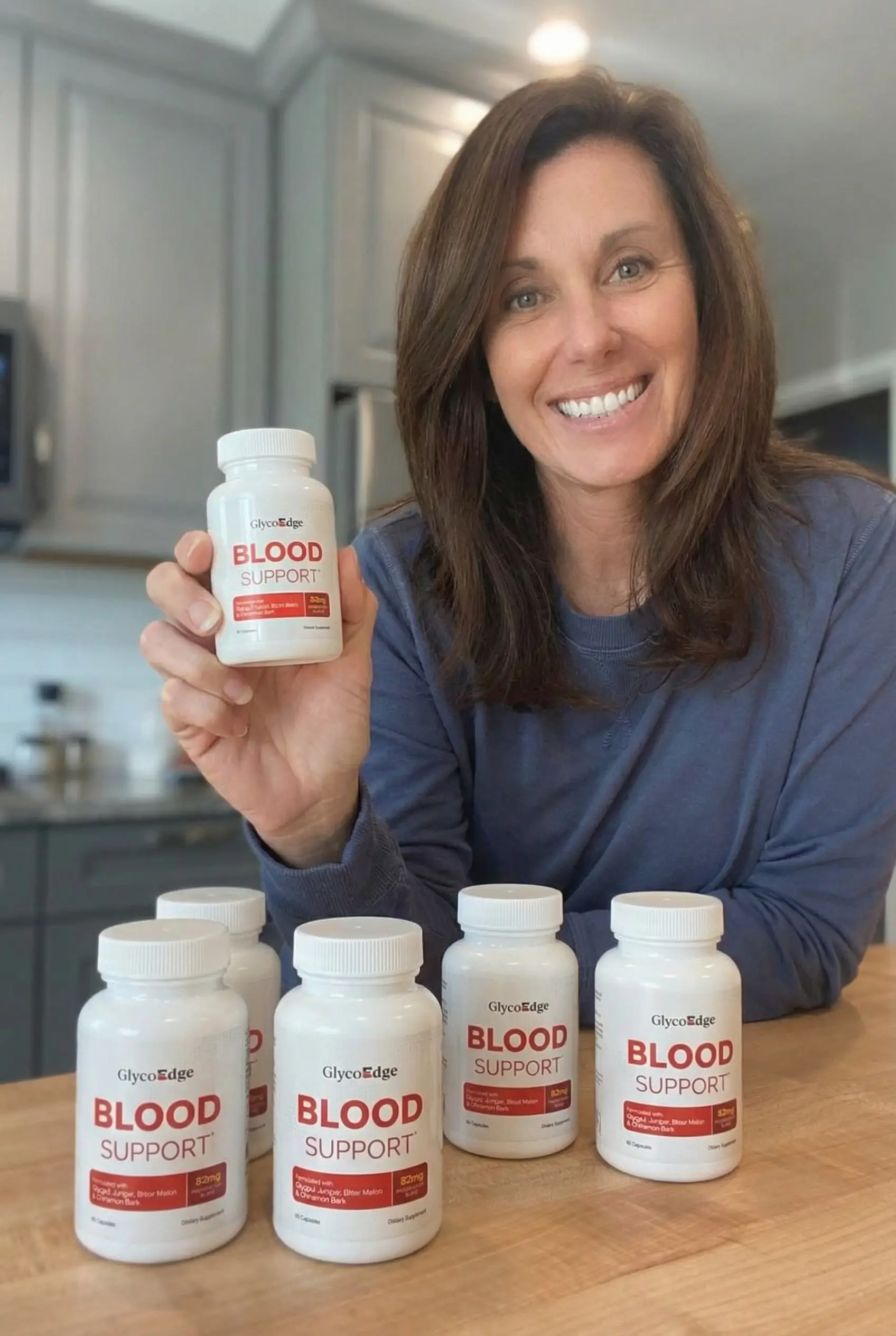 Karen L. holding GlycoEdge bottle